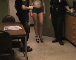 dressed like a hooker in halter top and hot pants from Death Valley s1e08!