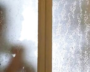 behind shower door!