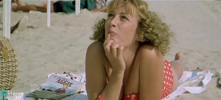 Bare Breasts on the beach in CEst La Vie!