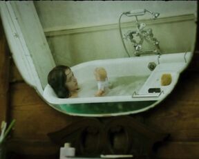 Nude in bathtub from The Quiet Ones!