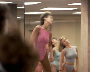 Jamie Lee Curtis and Marilu Henner in spandex with pokers in Perfect!